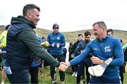 4 August 2025; GAA National Head of Hurling Willie Maher presents a sliotar to Brendan Cummins of Tipperary before the M. Donnelly GAA Poc Fada All-Ireland Finals at Annaverna Mountain in the Cooley Peninsula, Ravensdale, Louth. Photo by Piaras Ó Mídheach/Sportsfile