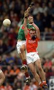 2 October 2004; Barry Moran, Mayo, in action against Malacahy Mackin, Armagh. All-Ireland U21 Football Final, Armagh v Mayo, Kingspan Breffni Park, Cavan. Picture credit; Damien Eagers / SPORTSFILE