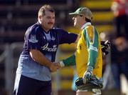 2 October 2004; Joe McNally, Dublin, shakes hands with Leitrim goalkeeper Damian Crossan at the end of the match. All Ireland Masters Final Replay, Dublin v Leitrim, Kingspan Breffni Park, Cavan. Picture credit; Damien Eagers / SPORTSFILE