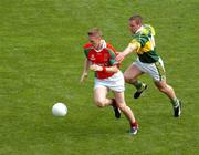 26 September 2004; David Heaney, Mayo, in action against Dara O Cinneide, Kerry. Bank of Ireland All-Ireland Senior Football Championship Final, Kerry v Mayo, Croke Park, Dublin. Picture credit; Pat Murphy / SPORTSFILE *** Local Caption *** Any photograph taken by SPORTSFILE during, or in connection with, the 2004 Bank of Ireland All-Ireland Senior Football Final which displays GAA logos or contains an image or part of an image of any GAA intellectual property, or, which contains images of a GAA player/players in their playing uniforms, may only be used for editorial and non-advertising purposes.  Use of photographs for advertising, as posters or for purchase separately is strictly prohibited unless prior written approval has been obtained from the Gaelic Athletic Association.