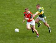 26 September 2004; David Heaney, Mayo, in action against Dara O Cinneide, Kerry. Bank of Ireland All-Ireland Senior Football Championship Final, Kerry v Mayo, Croke Park, Dublin. Picture credit; Pat Murphy / SPORTSFILE *** Local Caption *** Any photograph taken by SPORTSFILE during, or in connection with, the 2004 Bank of Ireland All-Ireland Senior Football Final which displays GAA logos or contains an image or part of an image of any GAA intellectual property, or, which contains images of a GAA player/players in their playing uniforms, may only be used for editorial and non-advertising purposes.  Use of photographs for advertising, as posters or for purchase separately is strictly prohibited unless prior written approval has been obtained from the Gaelic Athletic Association.