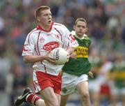26 September 2004; Marc Cunningham, Tyrone. All-Ireland Minor Football Championship Final, Kerry v Tyrone, Croke Park, Dublin. Picture credit; Ray McManus / SPORTSFILE *** Local Caption *** Any photograph taken by SPORTSFILE during, or in connection with, the 2004 All-Ireland Minor Football Final which displays GAA logos or contains an image or part of an image of any GAA intellectual property, or, which contains images of a GAA player/players in their playing uniforms, may only be used for editorial and non-advertising purposes.  Use of photographs for advertising, as posters or for purchase separately is strictly prohibited unless prior written approval has been obtained from the Gaelic Athletic Association.