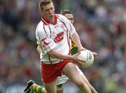26 September 2004; Marc Cunningham, Tyrone. All-Ireland Minor Football Championship Final, Kerry v Tyrone, Croke Park, Dublin. Picture credit; Ray McManus / SPORTSFILE *** Local Caption *** Any photograph taken by SPORTSFILE during, or in connection with, the 2004 All-Ireland Minor Football Final which displays GAA logos or contains an image or part of an image of any GAA intellectual property, or, which contains images of a GAA player/players in their playing uniforms, may only be used for editorial and non-advertising purposes.  Use of photographs for advertising, as posters or for purchase separately is strictly prohibited unless prior written approval has been obtained from the Gaelic Athletic Association.