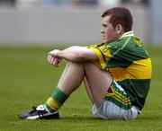 26 September 2004; Luke Quinn, Kerry, shows his dissapointment after defeat against Tyrone. All-Ireland Minor Football Championship Final, Kerry v Tyrone, Croke Park, Dublin. Picture credit; Ray McManus / SPORTSFILE *** Local Caption *** Any photograph taken by SPORTSFILE during, or in connection with, the 2004 All-Ireland Minor Football Final which displays GAA logos or contains an image or part of an image of any GAA intellectual property, or, which contains images of a GAA player/players in their playing uniforms, may only be used for editorial and non-advertising purposes.  Use of photographs for advertising, as posters or for purchase separately is strictly prohibited unless prior written approval has been obtained from the Gaelic Athletic Association.