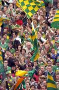 26 September 2004; Kerry fans cheer on their side during the game. Bank of Ireland All-Ireland Senior Football Championship Final, Kerry v Mayo, Croke Park, Dublin. Picture credit; Ray McManus / SPORTSFILE *** Local Caption *** Any photograph taken by SPORTSFILE during, or in connection with, the 2004 Bank of Ireland All-Ireland Senior Football Final which displays GAA logos or contains an image or part of an image of any GAA intellectual property, or, which contains images of a GAA player/players in their playing uniforms, may only be used for editorial and non-advertising purposes.  Use of photographs for advertising, as posters or for purchase separately is strictly prohibited unless prior written approval has been obtained from the Gaelic Athletic Association.