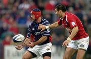 3 October 2004; Mike Mullins, Munster, in action against Mike Phillips, Llanelli Scarlets. Celtic League 2004-2005, Munster v Llanelli Scarlets, Thomond Park, Limerick. Picture credit; Brendan Moran / SPORTSFILE