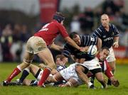 3 October 2004; Mike Mullins, Munster, in action against Somin Easterby, left, and Chris Wyatt, Llanelli Scarlets. Celtic League 2004-2005, Munster v Llanelli Scarlets, Thomond Park, Limerick. Picture credit; Brendan Moran / SPORTSFILE