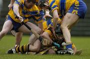 21 March 2004; DJ Carey, Kilkenny, is tackled by Clare defenders Brian Quinn and Sean McMahon. Allianz Hurling League 2004, Division 1A, Round 4, Clare v Kilkenny, Cusack Park, Ennis, Co. Clare. Picture credit; Ray McManus / SPORTSFILE