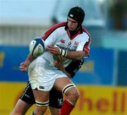 25 September 2004; Matt McCullough, Ulster, is tackled by David Bishop, Neath-Swansea Ospreys. Celtic League 2004-2005, Ulster v Neath-Swansea Ospreys, Ravenhill, Belfast. Picture credit; Matt Browne / SPORTSFILE