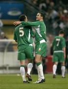 9 October 2004; Andy O'Brian (5) and John O'Shea, Republic of Ireland, after the final whistle. FIFA World Cup 2006 Qualifier, France v Republic of Ireland, Stade de France, Paris, France. Picture credit; Brendan Moran / SPORTSFILE