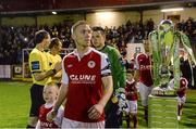 18 October 2013; St. Patrick’s Athletic captain Conor Kenna walks past the Airtricity League Premier Division Trophy before the start of the game. Airtricity League Premier Division, St. Patrick’s Athletic v Derry City, Richmond Park, Dublin. Picture credit: David Maher / SPORTSFILE