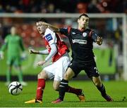 18 October 2013; Shane McFaul, St. Patrick’s Athletic, in action against David McDaid, Derry City. Airtricity League Premier Division, St. Patrick’s Athletic v Derry City, Richmond Park, Dublin. Picture credit: David Maher / SPORTSFILE
