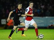 18 October 2013; Chris Forrester, St. Patrick’s Athletic, in action against Dean Jarvis, Derry City. Airtricity League Premier Division, St. Patrick’s Athletic v Derry City, Richmond Park, Dublin. Picture credit: David Maher / SPORTSFILE