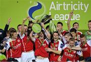 18 October 2013; St. Patrick’s Athletic captain Conor Kenna lifts the Airtricity League Premier Division Trophy alongside his team-mates. Airtricity League Premier Division, St. Patrick’s Athletic v Derry City, Richmond Park, Dublin. Picture credit: Matt Browne / SPORTSFILE