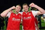 18 October 2013; St. Patrick’s Athletic's Kenny Browne, left, and Anto Flood celebrate with their medals. Airtricity League Premier Division, St. Patrick’s Athletic v Derry City, Richmond Park, Dublin. Picture credit: Matt Browne / SPORTSFILE