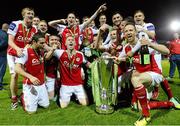 18 October 2013; St. Patrick’s Athletic players celebrate with the Airtricity League Premier Division Trophy. Airtricity League Premier Division, St. Patrick’s Athletic v Derry City, Richmond Park, Dublin. Picture credit: David Maher / SPORTSFILE