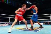 19 October 2013; Jason Quigley, Finn Valley BC, Donegal, representing Ireland, left, exchanges punches with Vijender Singh Beniwal, India, during their Men's Middleweight 75Kg Last 32 bout. AIBA World Boxing Championships Almaty 2013, Almaty, Kazakhstan. Photo by Sportsfile