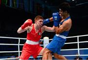 19 October 2013; Jason Quigley, Finn Valley BC, Donegal, representing Ireland, left, exchanges punches with Vijender Singh Beniwal, India, during their Men's Middleweight 75Kg Last 32 bout. AIBA World Boxing Championships Almaty 2013, Almaty, Kazakhstan. Photo by Sportsfile