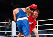 19 October 2013; Jason Quigley, Finn Valley BC, Donegal, representing Ireland, right, exchanges punches with Vijender Singh Beniwal, India, during their Men's Middleweight 75Kg Last 32 bout. AIBA World Boxing Championships Almaty 2013, Almaty, Kazakhstan. Photo by Sportsfile