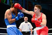19 October 2013; Jason Quigley, Finn Valley BC, Donegal, representing Ireland, right, exchanges punches with Vijender Singh Beniwal, India, during their Men's Middleweight 75Kg Last 32 bout. AIBA World Boxing Championships Almaty 2013, Almaty, Kazakhstan. Photo by Sportsfile