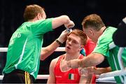 19 October 2013; Jason Quigley, Finn Valley BC, Donegal, representing Ireland, receives treatment from his corner inbetween rounds during his Men's Middleweight 75Kg Last 32 bout against Vijender Singh Beniwal, India. AIBA World Boxing Championships Almaty 2013, Almaty, Kazakhstan. Photo by Sportsfile