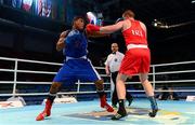 19 October 2013; Con Sheehan, Clonmel BC, Tipperary, representing Ireland, right, exchanges punches with Yohandi Ortega, Cuba, during their Men's Super Heavyweight +91Kg Last 32 bout. AIBA World Boxing Championships Almaty 2013, Almaty, Kazakhstan. Photo by Sportsfile