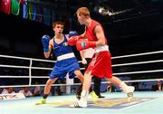 19 October 2013; Michael Conlan, St John Bosco BC, Belfast, representing Ireland, left, exchanges punches with Krisztian Nagy, Hungary, during their Men's Bantamweight 56Kg Last 32 bout. AIBA World Boxing Championships Almaty 2013, Almaty, Kazakhstan. Picture credit: Paul Mohan / SPORTSFILE