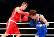 19 October 2013; Krisztian Nagy, Hungary, left, exchanges punches with Michael Conlan, St John Bosco BC, Belfast, representing Ireland, during their Men's Bantamweight 56Kg Last 32 bout. AIBA World Boxing Championships Almaty 2013, Almaty, Kazakhstan. Picture credit: Paul Mohan / SPORTSFILE