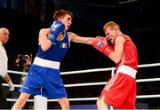 19 October 2013; Michael Conlan, St John Bosco BC, Belfast, representing Ireland, left, exchanges punches with Krisztian Nagy, Hungary, during their Men's Bantamweight 56Kg Last 32 bout. AIBA World Boxing Championships Almaty 2013, Almaty, Kazakhstan. Photo by Sportsfile