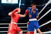 19 October 2013; Krisztian Nagy, Hungary, left, exchanges punches with Michael Conlan, St John Bosco BC, Belfast, representing Ireland, during their Men's Bantamweight 56Kg Last 32 bout. AIBA World Boxing Championships Almaty 2013, Almaty, Kazakhstan. Photo by Sportsfile
