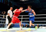19 October 2013; Michael Conlan, St John Bosco BC, Belfast, representing Ireland, right, exchanges punches with Krisztian Nagy, Hungary, during their Men's Bantamweight 56Kg Last 32 bout. AIBA World Boxing Championships Almaty 2013, Almaty, Kazakhstan. Photo by Sportsfile