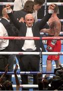 19 October 2013; Carl Frampton's manager Barry McGuigan celebrates Carl win raising his arms to the crowd after IBF Super Bantamweight World Title Eliminator between Carl Frampton v Jeremy Parodi at The Odyssey Arena, Belfast, Co. Antrim. Picture credit: Liam McBurney / SPORTSFILE