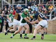 19 October 2013; Richie Hogan, Leinster, in action against Paul Curran, 13, and Tom Condon, Munster. Celtic Champions Classic Super Hurling 11s Exhibition game, Lacrosse Pitch, Arllotta Stadium,  University of Notre Dame, Chicago, USA. Picture credit: Ray McManus / SPORTSFILE