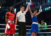 20 October 2013; Sean McComb, Holy Trinity BC, Belfast, representing Ireland, right, is declared the winner over Gildas Bangana, Central Africa, after their Men's Lightweight 60Kg Last 32 bout. AIBA World Boxing Championships Almaty 2013, Almaty, Kazakhstan. Photo by Sportsfile