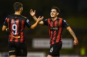 22 August 2025; Dawson Devoy of Bohemians, right, celebrates with teammate Colm Whelan after scoring their side's third goal during the SSE Airtricity Men's Premier Division match between Bohemians and Cork City at Dalymount Park in Dublin. Photo by Tyler Miller/Sportsfile