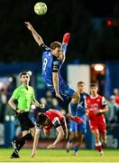 29 August 2025; Max Hutchinson of Finn Harps in action against Colin Conroy of Treaty United during the SSE Airtricity Men's First Division match between Finn Harps and Treaty United at Finn Park in Ballybofey, Donegal. Photo by Thomas Flinkow/Sportsfile