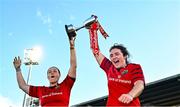 30 August 2025; Chloe Pearse, left, and Deirbhile Nic a Bháird of Munster celebrate with the cup after the Vodafone Women’s Interprovincial Championship final match between Leinster and Munster at Energia Park in Dublin. Photo by Tyler Miller/Sportsfile