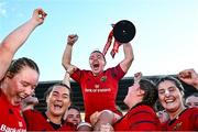 30 August 2025; Maeve Óg O'Leary of Munster, centre, celebrates with team-mates and the cup after the Vodafone Women’s Interprovincial Championship final match between Leinster and Munster at Energia Park in Dublin. Photo by Tyler Miller/Sportsfile