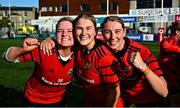 30 August 2025; Munster players, from left, Aoife Corey, Kate Flannery and Clodagh O'Halloran celebrate after the Vodafone Women’s Interprovincial Championship final match between Leinster and Munster at Energia Park in Dublin. Photo by Tyler Miller/Sportsfile
