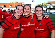 30 August 2025; Munster players, from left, Meghan Crilly, Aoife Corey and Deirbhile Nic a Bháird celebrate after the Vodafone Women’s Interprovincial Championship final match between Leinster and Munster at Energia Park in Dublin. Photo by Tyler Miller/Sportsfile
