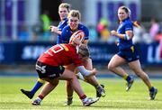 30 August 2025; Cara Martin of Leinster in action against Kate Flannery of Munster during the Vodafone Women’s Interprovincial Championship final match between Leinster and Munster at Energia Park in Dublin. Photo by Shauna Clinton/Sportsfile