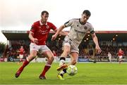 30 August 2025; James Clarke of Bohemians in action against Ollie Denham of Sligo Rovers during the SSE Airtricity Men's Premier Division match between Sligo Rovers and Bohemians at The Showgrounds in Sligo. Photo by Thomas Flinkow/Sportsfile