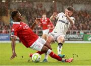 30 August 2025; Adam McDonnell of Bohemians is tackled by Edwin Agbaje of Sligo Rovers during the SSE Airtricity Men's Premier Division match between Sligo Rovers and Bohemians at The Showgrounds in Sligo. Photo by Thomas Flinkow/Sportsfile