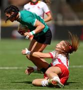31 August 2025; Amee Leigh Costigan of Ireland is tackled by Zahia Perez of Spain during the Women's Rugby World Cup 2025 Pool C match between Ireland and Spain at Franklin's Gardens in Northampton, England. Photo by Harry Murphy/Sportsfile
