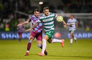 31 August 2025; Lee Grace of Shamrock Rovers in action against Jack Stretton of Drogheda United during the SSE Airtricity Men's Premier Division match between Shamrock Rovers and Drogheda United at Tallaght Stadium in Dublin. Photo by Stephen McCarthy/Sportsfile
