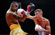 5 September 2025; Codie Smith, right, and Mario Victorino Vera in action during their super featherweight bout at the 3 Arena in Dublin. Photo by David Fitzgerald/Sportsfile