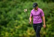 5 September 2025; Adrien Saddier of France reacts on the 17th green during day two of the Amgen Irish Open Golf Championship 2025 at The K Club in Straffan, Kildare. Phoot by Seb Daly/Sportsfile