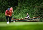 5 September 2025; A spectator in a boat on the rver Liffey watches Padraig Harrington of Ireland line up a putt on the 17th green during day two of the Amgen Irish Open Golf Championship 2025 at The K Club in Straffan, Kildare. Phoot by Seb Daly/Sportsfile