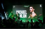 5 September 2025; Michael Conlan, right, walks out with former Ireland and Munster rugby player Simon Zebo, centre, and former Ireland and current Wrexham footballer James McClean, ahead of his vacant WBC International Featherweight title bout against Jack Bateson at the 3 Arena in Dublin. Photo by David Fitzgerald/Sportsfile