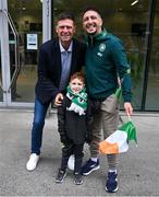 6 September 2025; Former Republic of Ireland player Niall Quinn poses for a photo with supporters Chris and Cameron Storey, from Blanchardstown in Dublin, before the FIFA World Cup 2026 Group F qualifying match between Republic of Ireland and Hungary at the Aviva Stadium in Dublin. Photo by Ben McShane/Sportsfile